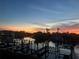 Evening view of the docks from the condo at 637 Pinellas Bayway S # 111, St Petersburg, FL 33715