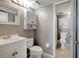 Clean and bright bathroom with white fixtures and a tiled shower/tub combo at 6923 Stonesthrow N Cir # 4105, St Petersburg, FL 33710