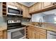 Modern kitchen featuring stainless steel appliances and ample counter space at 6923 Stonesthrow N Cir # 4105, St Petersburg, FL 33710