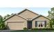 Charming single-story home with a neutral color palette, well-manicured lawn, and inviting curb appeal at 706 Ace Outlaw Ave, Ruskin, FL 33570