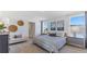 Spacious bedroom with large windows and stylish bedding at 7123 Broad River Ave, Land O Lakes, FL 34638