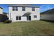 Spacious backyard with grassy area at 7423 Pulteney Dr, Zephyrhills, FL 33545
