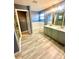 Spacious bathroom with double sinks, garden tub, and glass enclosed shower at 7423 Pulteney Dr, Zephyrhills, FL 33545