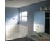 Clean bathroom with a bathtub, double vanity, and updated fixtures at 7423 Pulteney Dr, Zephyrhills, FL 33545