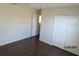 Bedroom with double door closet and window at 7423 Pulteney Dr, Zephyrhills, FL 33545