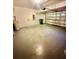 Clean garage space offering lots of room for vehicles or storage at 7423 Pulteney Dr, Zephyrhills, FL 33545