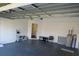 Attached garage with extra storage space at 7423 Pulteney Dr, Zephyrhills, FL 33545
