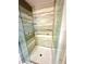 Modern shower with glass door and sleek tile, offering a spa-like experience in the bathroom at 7423 Pulteney Dr, Zephyrhills, FL 33545