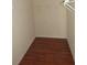 Large walk-in closet with ample shelving and hanging space at 7423 Pulteney Dr, Zephyrhills, FL 33545