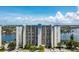 High-rise building with waterfront views and parking at 9495 Blind Pass Rd # 706, St Pete Beach, FL 33706