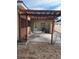 Covered patio area great for outdoor dining and lounging, offering a relaxing backyard retreat at 988 Bruce Ave, Clearwater Beach, FL 33767