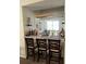 Bar area with marble countertop and a built-in wine rack at 10319 Boyette Creek Blvd, Riverview, FL 33569