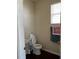 Bathroom with a modern toilet and a towel rack at 10319 Boyette Creek Blvd, Riverview, FL 33569