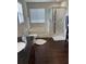 Bright bathroom featuring a soaking tub, a separate glass-enclosed shower, and a granite-topped vanity at 10319 Boyette Creek Blvd, Riverview, FL 33569