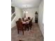 Formal dining room with a beautiful table set for six at 10319 Boyette Creek Blvd, Riverview, FL 33569