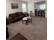 Living room features a bar area, and is carpeted for added comfort at 10319 Boyette Creek Blvd, Riverview, FL 33569