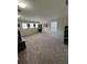 Spacious living room with multiple windows for plenty of natural light at 10319 Boyette Creek Blvd, Riverview, FL 33569