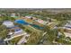 Aerial view of community with golf course and lake at 10433 Isleworth Ave, Tampa, FL 33647