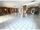 Open and spacious living room with tiled flooring under renovation at 11300 7Th E St, Treasure Island, FL 33706