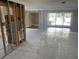 Open-concept living room with tile floors and water view at 11300 7Th E St, Treasure Island, FL 33706
