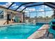 Relax in the screened-in pool area with a hammock and water features at 11507 Cedar Valley Dr, Riverview, FL 33569