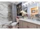Elegant bathroom with marble vanity and walk-in shower at 12518 Midpointe Dr, Riverview, FL 33578