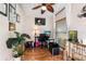 Home office with hardwood floors and ample natural light at 12518 Midpointe Dr, Riverview, FL 33578