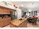 Open kitchen boasts granite countertops and stainless steel appliances at 12518 Midpointe Dr, Riverview, FL 33578