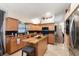 Modern kitchen with granite countertops and stainless steel appliances at 12518 Midpointe Dr, Riverview, FL 33578