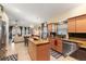 Kitchen with granite island and stainless steel appliances at 12518 Midpointe Dr, Riverview, FL 33578