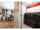 Laundry room with modern washer and dryer set at 12518 Midpointe Dr, Riverview, FL 33578