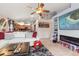 Spacious living room with fireplace and comfortable seating at 12518 Midpointe Dr, Riverview, FL 33578