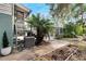 AC unit, deck, and walkway leading to the pool area at 1406 Butch Cassidy Trl, Wimauma, FL 33598