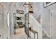 Bright and spacious entryway with view to the living room and upstairs at 1406 Butch Cassidy Trl, Wimauma, FL 33598