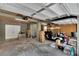 Attached garage with ample space for vehicles and storage at 1406 Butch Cassidy Trl, Wimauma, FL 33598
