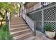 Steps leading to a raised porch with lattice detail at 1406 Butch Cassidy Trl, Wimauma, FL 33598