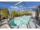 Inviting screened-in pool area at 15933 Adobe Dr, Hudson, FL 34667