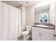 Bathroom with toilet, shower, and vanity at 16615 Parker River St, Wimauma, FL 33598