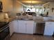 Updated kitchen boasting stainless steel appliances and granite countertops at 19029 Us Highway 19 N # 33A, Clearwater, FL 33764