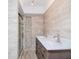 Modern bathroom with double vanity and a large shower at 2612 Pearce Dr # 304, Clearwater, FL 33764