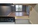 Living room with laminate wood floor and view to outdoors at 2625 State Road 590 # 622, Clearwater, FL 33759