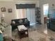 Living room with sofa, love seat, and coffee table at 3509 Maple Grove Way, Plant City, FL 33565