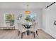 Bright dining room featuring a round table and four chairs at 420 Madison S St, St Petersburg, FL 33711