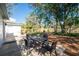 Relaxing patio with table and chairs, shaded backyard at 420 Madison S St, St Petersburg, FL 33711