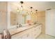 Bathroom boasts double vanity and granite countertops at 504 S Florida Ave # 212, Tarpon Springs, FL 34689