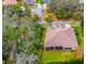 Backyard aerial view showcasing the home's layout and surrounding trees at 5212 Candler View Dr, Lithia, FL 33547