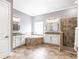 This is a bathroom with a glass-enclosed shower, a soaking tub, and two vanities with mirrors at 5212 Candler View Dr, Lithia, FL 33547