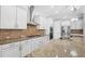 Updated kitchen with granite countertops, stainless steel appliances, and modern cabinetry at 5212 Candler View Dr, Lithia, FL 33547