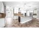 Spacious kitchen featuring white cabinets, granite countertops, stainless steel appliances, and tiled backsplash at 5212 Candler View Dr, Lithia, FL 33547