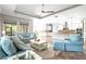 Bright, inviting living room with stylish decor, an open layout, and large windows at 5212 Candler View Dr, Lithia, FL 33547